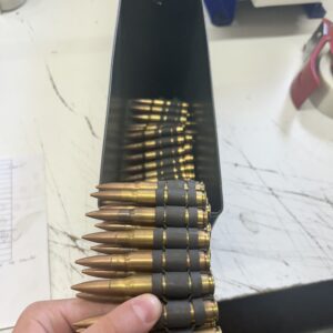 8mm Mauser dummy rounds. 100 round linked belt.