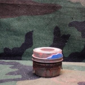 M79/203 - Metal pusher with broken plastic and orange die on pusher. Needs cleaning.